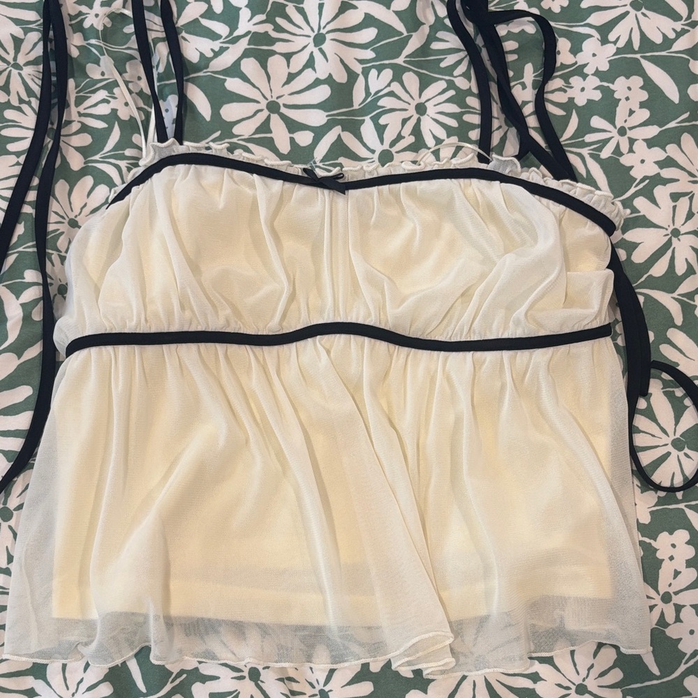Elegant Cream Tank Top with Black Accents